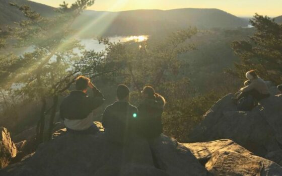 hiking-group-sunset