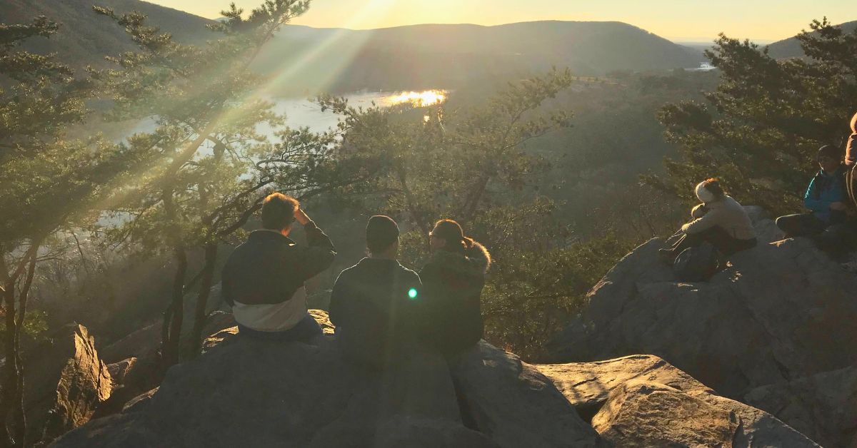 hiking-group-sunset